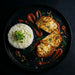 Plated dish with breaded chicken, rice, and ketchup on a dark background