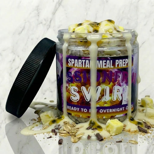 Meal prep container with 'Passionfruit Swirl' flavor on a marble surface
