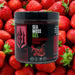 Sea moss gel container labeled 'Strawberry Punch' surrounded by strawberries