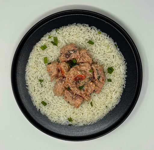 Grilled Chicken breast tossed in house creamy Tuscan sauce paired with jasmine rice.